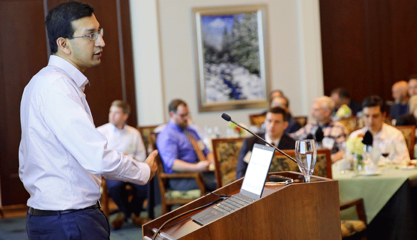 photograph of Raj Chetty, an economist at Harvard University, speaking at a podium