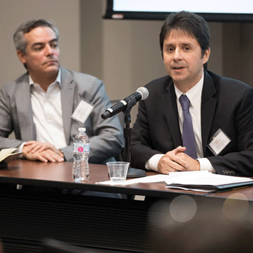 Marcelo Bernal of Merchant e-Solutions, left, and Nelson Mikovenyi of Delta Air Lines speak about business opportunities in Brazil. Photo by Fabio Laub