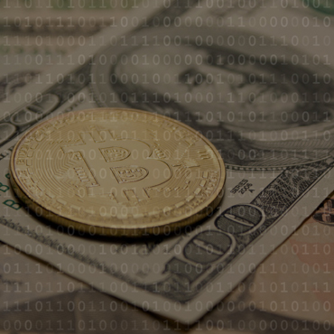 photograph of a bitcoin coin laid on top of a one-hundred dollar bill overlaid by binary digits
